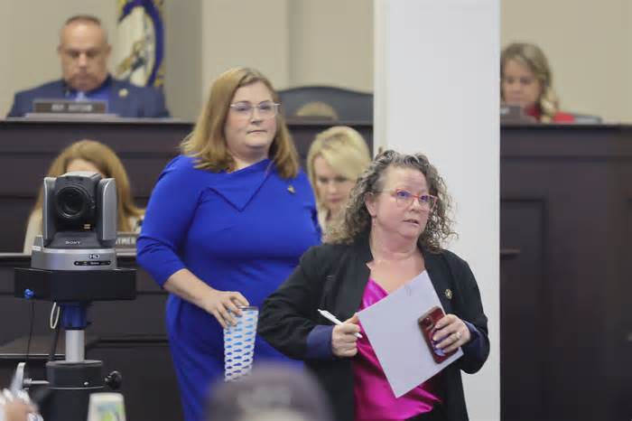 Democrats walk out of a Kentucky House committee hearing Thursday, March 7, 2024, in Frankfort, Ky. The walkout occurred as the GOP-led committee took up a bill dealing with expanding access to services for women facing nonviable pregnancies. (Ryan Hermens/Lexington Herald-Leader via AP)