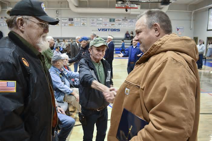 U.S. Sen. Jon Tester speaks with veterans attending a Veterans Day event at Bigfork High School, on Nov. 10, 2023, in Bigfork, Mont. Tester is seeking re-election to a fourth term. (AP Photo/Matthew Brown)