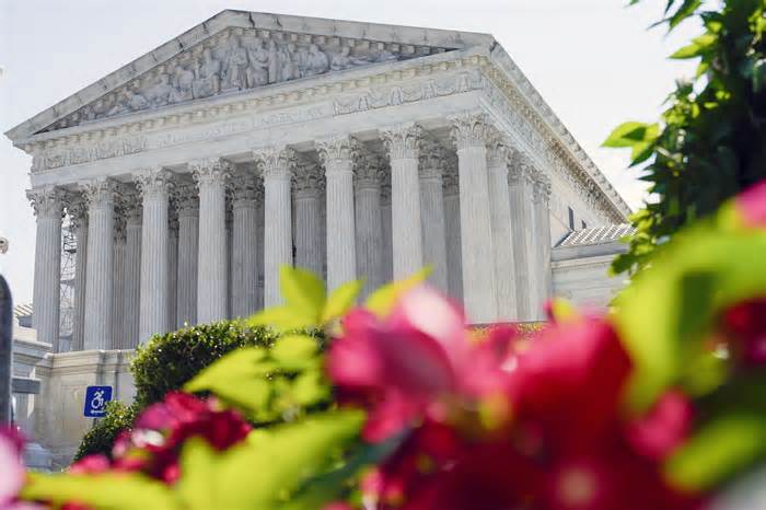 FILE - The U.S. Supreme Court is seen on July 13, 2023, in Washington. In arguments on Nov. 1, Supreme Court justices will weigh a California man's attempt to trademark a phrase mocking former President Donald Trump as 
