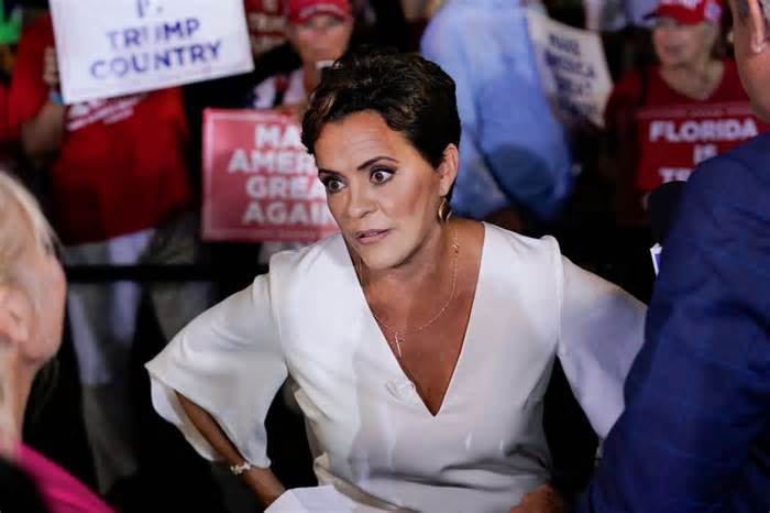 Former Arizona Republican gubernatorial candidate Kari Lake talks in the Spin Room after former President Donald Trump held a campaign rally in Hialeah, Fla., Wednesday, Nov. 8, 2023. (AP Photo/Lynne Sladky)