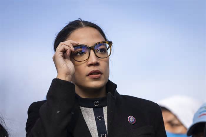 Fact Check: AOC Supposedly Tweeted 'We Should Just Print the $34 Trillion and Pay Off Our National Debt.' It's a Dubious Quote
