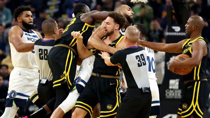 Thompson, Green, McDaniels ejected after Wolves-Warriors fight