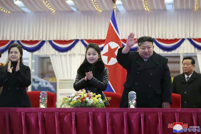 FILE - In this photo provided by the North Korean government, North Korean leader Kim Jong Un, second right, with his daughter and his wife Ri Sol Ju, left, attends a performance to celebrate the New Year in Pyongyang, North Korea, Sunday, Dec. 31, 2023. Independent journalists were not given access to cover the event depicted in this image distributed by the North Korean government. The content of this image is as provided and cannot be independently verified. Korean language watermark on image as provided by source reads: 