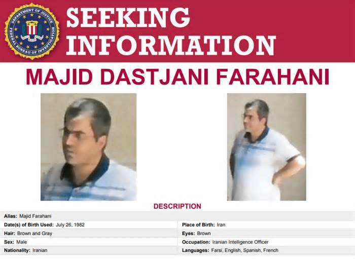The FBI warning included grainy photos of Mr Farahani