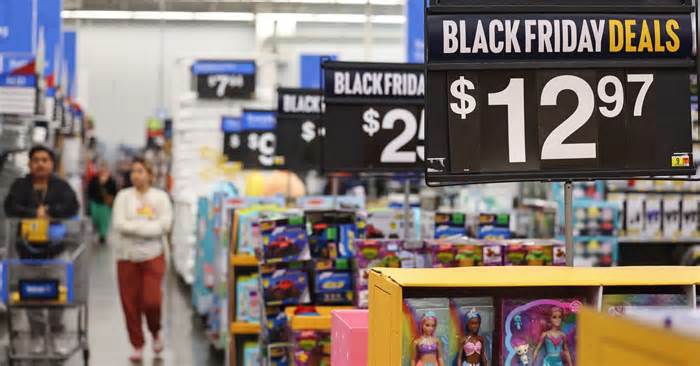 Barbie dolls (R) are displayed for sale ahead of Black Friday at a Walmart Supercenter on November 14, 2023 in Burbank, California.