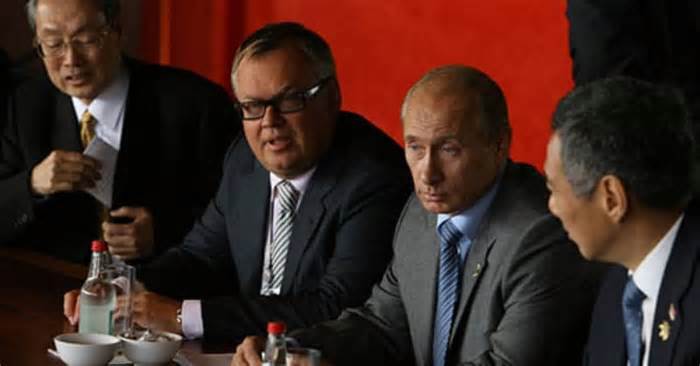 Andrey Kostin (left of Putin) was sanctioned by the U.S. in 2018. By: Wikipedia