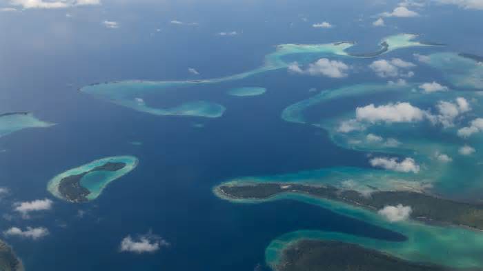 Aerial view photograph of small islands in the Solomon Islands.