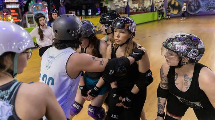 Members of the Long Island Roller Rebels, practice skills, Tuesday, March 19, 2023, at United Skates of America in Seaford, N.Y.