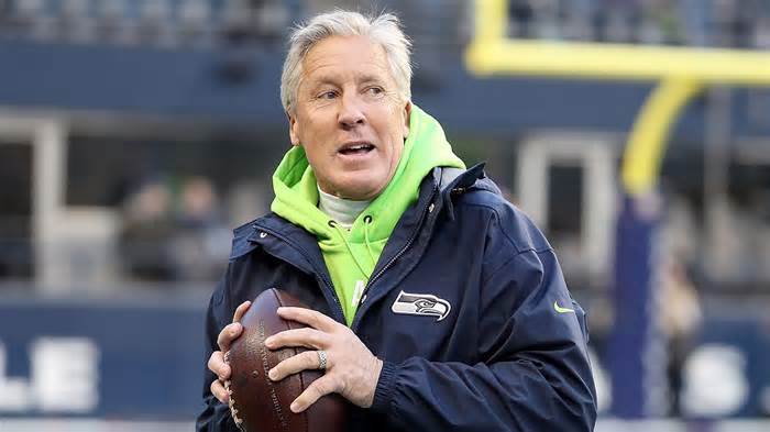 Head coach Pete Carroll of the Seattle Seahawks throws the ball on the field before the game against the Minnesota Vikings at CenturyLink Field on December 02, 2019 in Seattle, Washington.