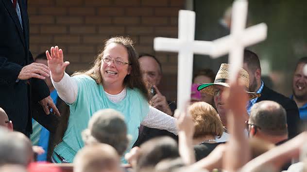 Rowan County Clerk of Courts Kim Davis waves to a crowd of her supporters at a rally in front of the Carter County Detention Center on September 8, 2015 in Grayson, Kentucky.