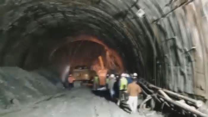 Workers trapped after tunnel collapse