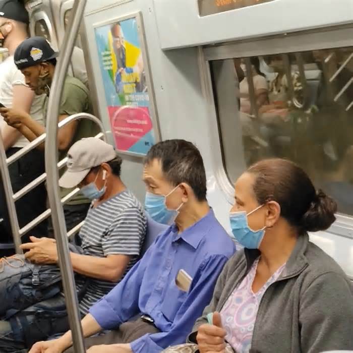 Masked subway riders