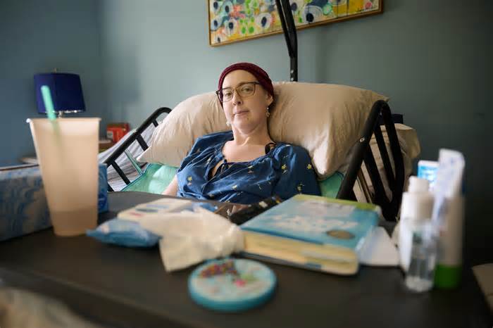 Erin Morris at her Louisville home on Aug. 11, 2023. Morris was diagnosed with terminal cancer, and she and her husband enlisted the services of 