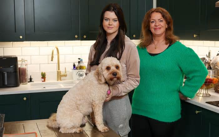 Libby, pictured with mum Kym and dog Louie