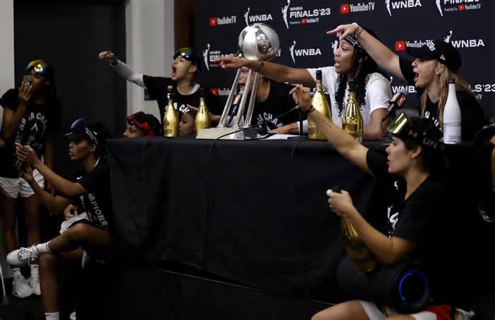 Members of the Las Vegas Aces speak in a news conference last month after Las Vegas defeated the New York Liberty in Game 4 of the WNBA Finals to clinch its second straight championship. (Photo by Sarah Stier/Getty Images)
