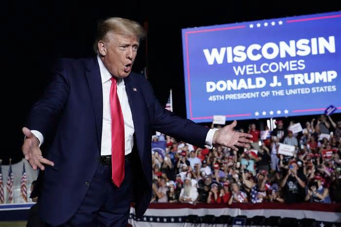 FILE- Former President Donald Trump speaks at a rally Friday, Aug. 5, 2022, in Waukesha, Wis. The Wisconsin Ethics Commission is recommending that state prosecutors file felony charges against a fundraising committee for Trump and state Rep. Janel Brandtjen, a Trump ally, related to an effort last year to unseat Assembly Speaker Robin Vos. (AP Photo/Morry Gash, File)