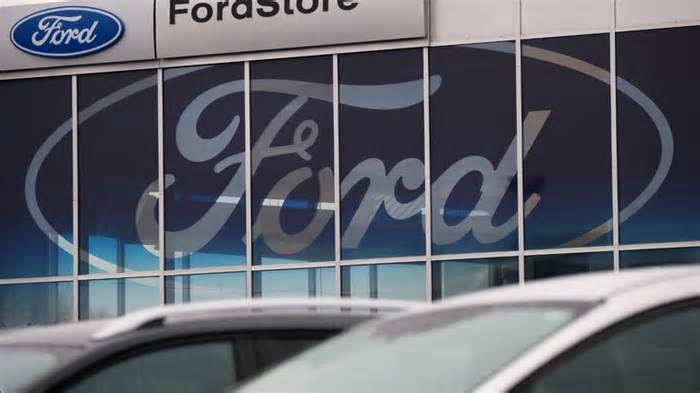 Ford storefront with cars