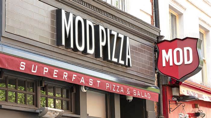 LONDON, UNITED KINGDOM - 2020/06/02: MOD Pizza logos on their restaurant in Leicester Square. (Photo by Dave Rushen/SOPA Images/LightRocket via Getty Images)