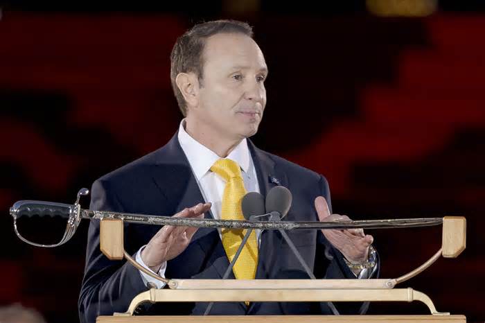 Louisiana Republican Gov. Jeff Landry speaks during his inauguration ceremony at the State Capitol building in Baton Rouge, La., Sunday, Jan. 7, 2024. The ceremony was moved because of forecasted rain on Monday, Jan. 8, the actual date Landry officially becomes governor. (AP Photo/Matthew Hinton)