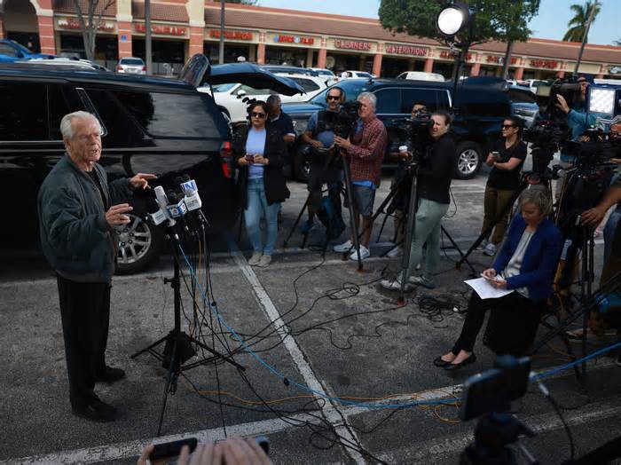 The first former Trump White House official to go to prison gave a final plea in the parking lot of a Miami strip mall: 'Navarro is going to prison today'