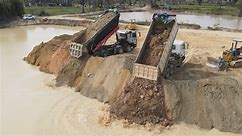 Amazing Good job Komatsu Dozers Slide Pushing Soil to Clear Deep Water With Dump Trucks Teams..03