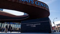 A mysterious giant shoebox appeared overnight at the Barclays Center – and its contents left onlooke
