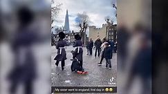 Royal guard knocks child to ground during march