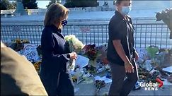 Nancy Pelosi leaves flowers at memorial for Ruth Bader Ginsburg