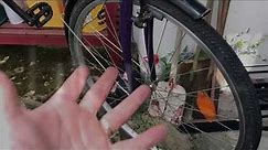 How to replace a bicycle front wire wheel bike disassembling and assembling with Nut locked axle DIY