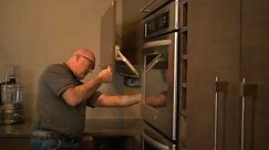 Lift-Up Appliance Garage Adjustments | Omega Cabinetry