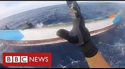 Dramatic migrant rescue as UN warns of rising deaths in Mediterranean and North Atlantic - BBC News