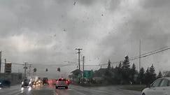 Video captures strong tornado in Michigan