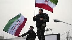 At World Cup, U.S. soccer scrubs Islamic emblem from Iran flag