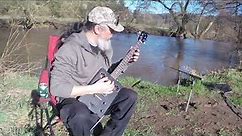 Cigar Box Guitar improvised jam on the River (Pt 1 of 2)