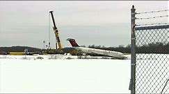 Airplane skids off runway at Pittsburgh airport