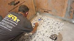 Setting Pebble Stone Shower Floor
