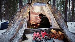 Winter Camping with Tent and Wood Stove.