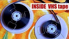 INSIDE VHS TAPE. How to put the cassette back together?