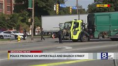 Police surround garbage truck, shuts down Upper Falls Blvd.