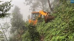 Dense Forest Mountain Road Transformation with JCB Backhoe
