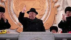 Kim Jong Un presides over military parade