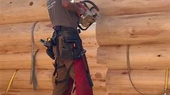 11_Cutting an archway for a Western Red Cedar Log Cabin during construction at our | Lake Country Log Homes