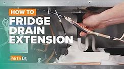 How to replace Defrost Drain Tube Extension part # W10776917 on your Whirlpool Refrigerator