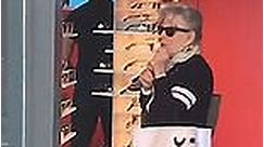 Bette Midler tries on some shades at Ray-Ban store in LA
