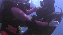 Female diver attacked by male diver! [scuba fight]