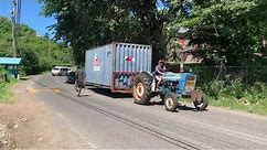 Ford 4000 Tractor moving a 20 foot shipping container
