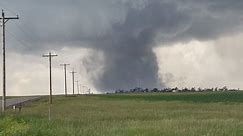 Lightning Strike Startles Storm Chaser While Filming Large Tornado in Nebraska