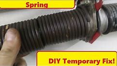 How to replace or temporarily repair a broken garage door spring on a DIY budget