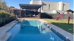 Another poolside pergola completed, with an extremely happy client! Ekodeck Designer Series decking. Stratco Colourbond Ezyslat screening for additional privacy. #happycustomer #christiesbeach #poolsideliving #wowfactor #pergolas #swimmingpools #designstudio #giveusacall #loveourjob #screening | All Decked Out