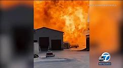 Caught on camera: Fiery explosion after gas truck slams into propane tank